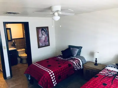 Cama o camas de una habitación en Amplia casa en Colonia Campestre