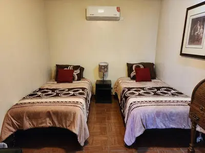 Cama o camas de una habitación en Departamento en planta baja en centro de Cananea