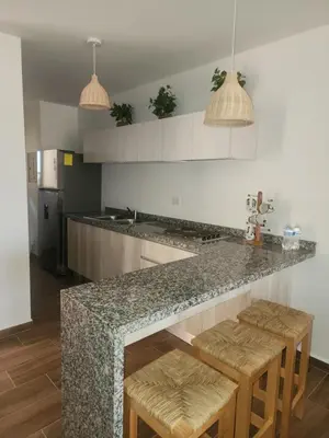 Una cocina o zona de cocina en Punta Paraíso en Nuevo Altata DEPARTAMENTO