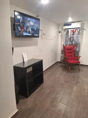 Una televisión o centro de entretenimiento en Casa Sol Central