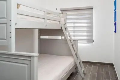 Cama o camas de una habitación en Cómoda Villa para pasar momentos increíbles