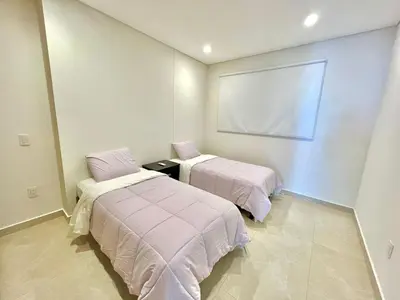 Cama o camas de una habitación en Camino al Mar 802 Vista al Mar