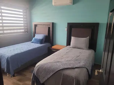 Cama o camas de una habitación en Bring the family to Mazatlán