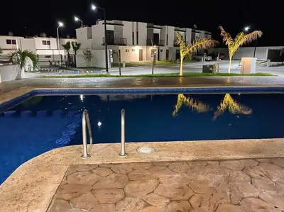 Piscina en o cerca de Hermosa y acogedora casa en comunidad privada