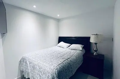 Cama o camas de una habitación en Departamento ejecutivo nuevo