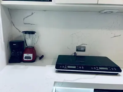 Una cocina o zona de cocina en Departamento ejecutivo nuevo