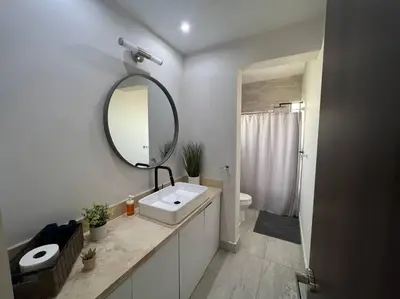 Un baño de Consulado Home