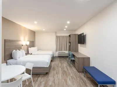 Cama o camas de una habitación en Hotel Mesaluna Short & Long Stay