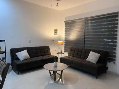 Zona de estar de Departamento 102